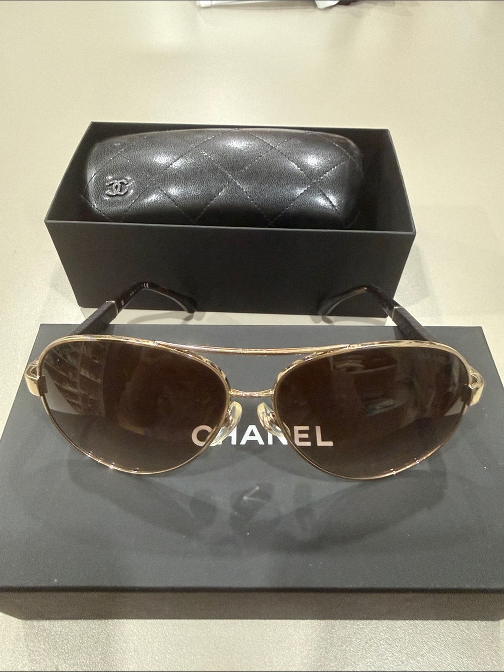 CHANEL Gold Frame Brown Lens Aviator Sunglasses with Black Temple Tips